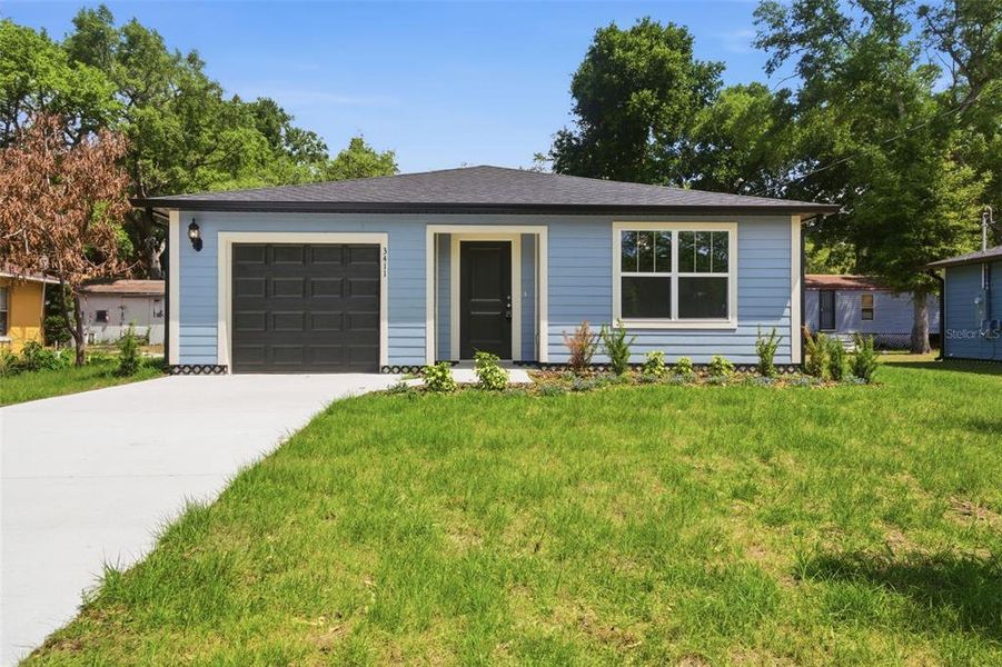 Front exterior of a new home in , Apopka, FL, highlighting curb appeal (Image 20).