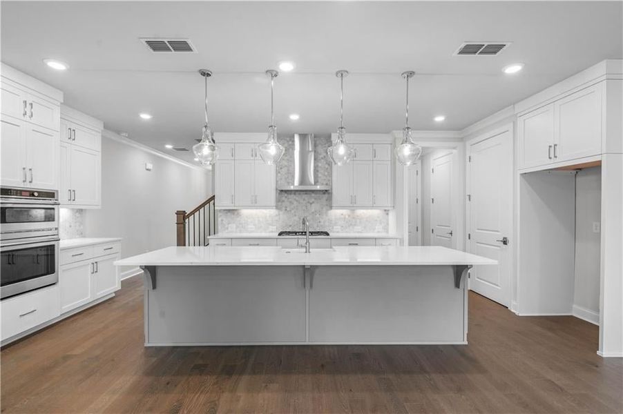 Oversized 12' Kitchen Island with 4 designer pendants Oversized 12' Kitchen Island with 4 designer pendants
