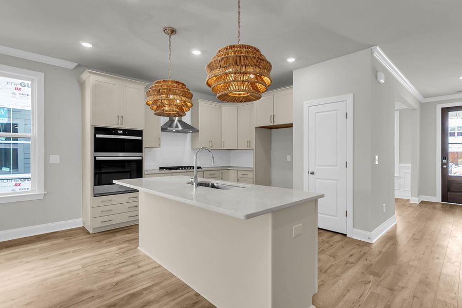 Furnished interior view inside a new home in Tidewater at Lakes of Cane Bay, Summerville (Image 4).