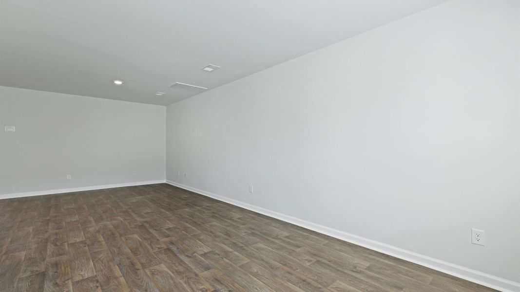 Representative unfurnished interior of a home built from the DENMARK by D.R. Horton in Pine Hills Townhomes at Cane Bay, Summerville (Image 17).