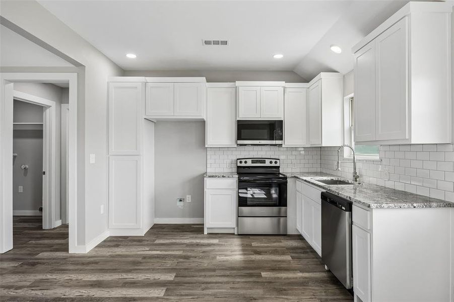Furnished interior view inside a new home in , Itasca (Image 13).