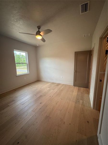 Spacious, unfurnished interior of a new home in Laureate Village, Newberry (Image 42).