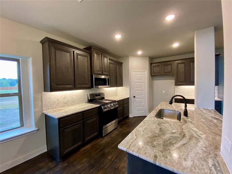 Listed home has White Quartz w/grey veins