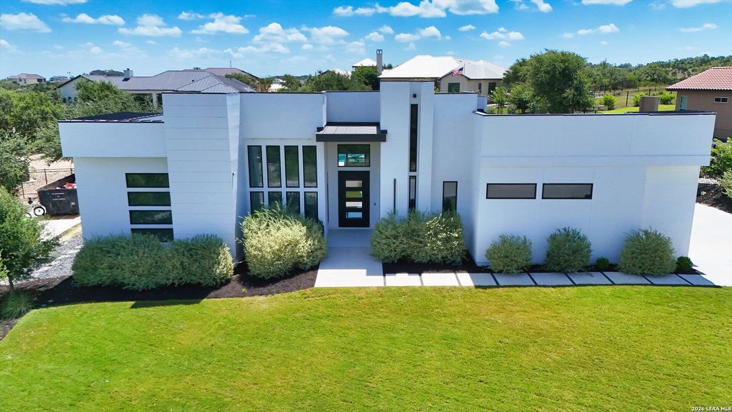 Front exterior of a new home in , San Antonio, TX, highlighting curb appeal (Image 32).