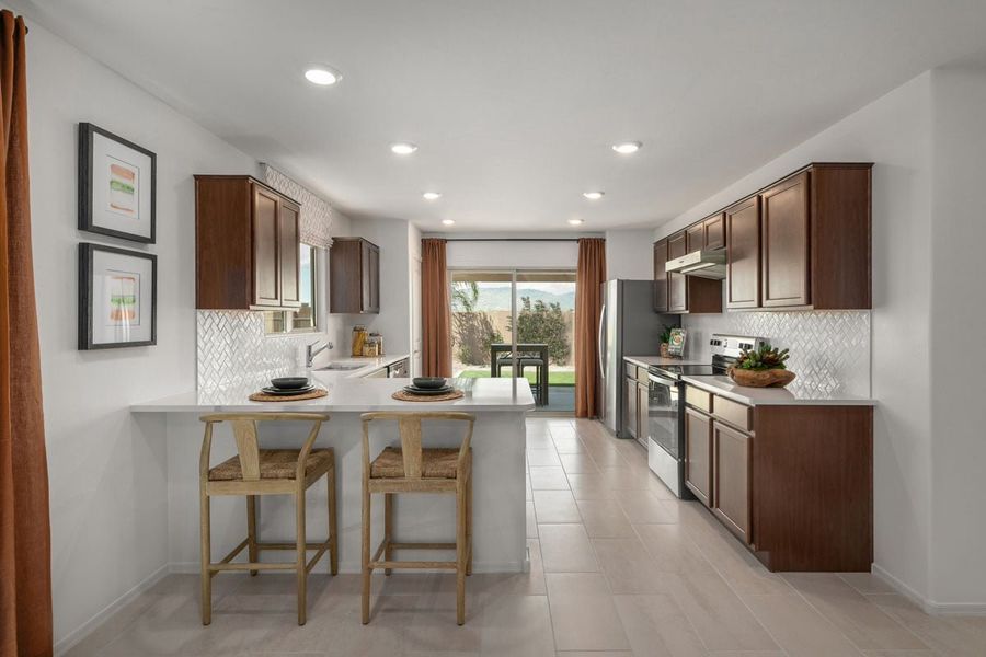 Representative furnished interior of a home built from the 1216 Modeled by KB Home in Founders Ridge, Vail (Image 5).