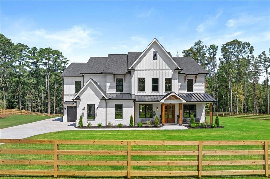 Front exterior of a new home in , Dacula, GA, highlighting curb appeal (Image 30).