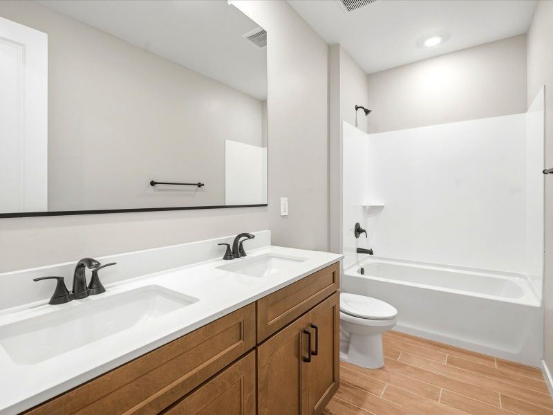 Furnished interior view inside a new home in Blossom Rock Signature Series, Apache Junction (Image 6).