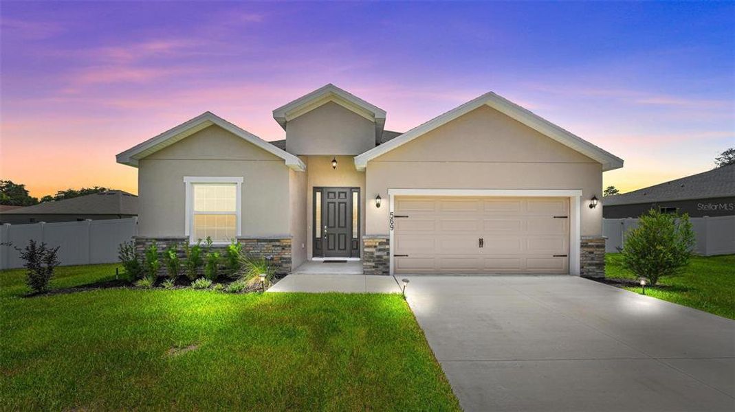 Front exterior of a new home in Silver Springs Shores, Ocala, FL, highlighting curb appeal (Image 28). Front exterior of a new home in Silver Springs Shores, Ocala, FL, highlighting curb appeal (Image 28).