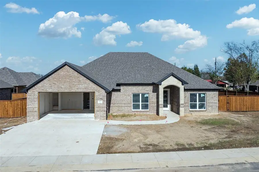 Front exterior of a new home in , Mabank, TX, highlighting curb appeal (Image 1). Front exterior of a new home in , Mabank, TX, highlighting curb appeal (Image 1).