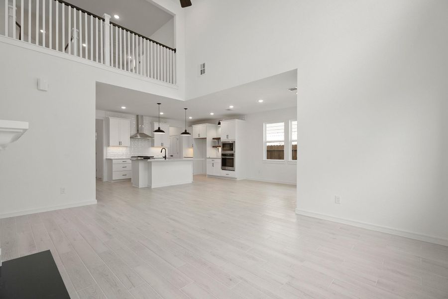 Open great room with high volume ceilings (*Photo not of actual home and used for illustration purposes only.) Open great room with high volume ceilings (*Photo not of actual home and used for illustration purposes only.)