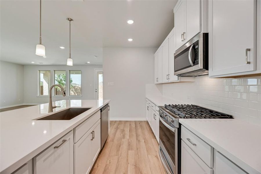 Furnished interior view inside a new home in Villages of Hurricane Creek, Anna (Image 9). Furnished interior view inside a new home in Villages of Hurricane Creek, Anna (Image 9).