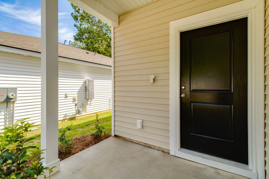 Exterior details and patio area of a home in Grand Arbor, Blythewood (Image 3).