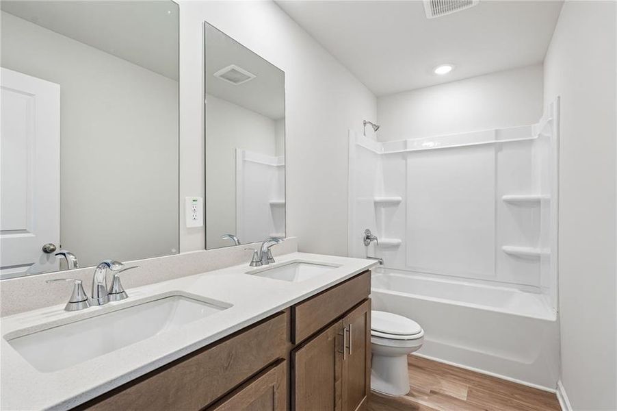 Furnished interior view inside a new home in Northwoods at Mirror Lake, Villa Rica (Image 35).