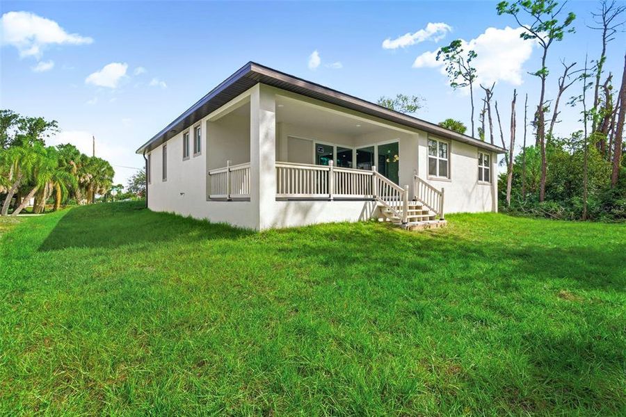 Exterior details and patio area of a home in , Port Charlotte (Image 31). Exterior details and patio area of a home in , Port Charlotte (Image 31).