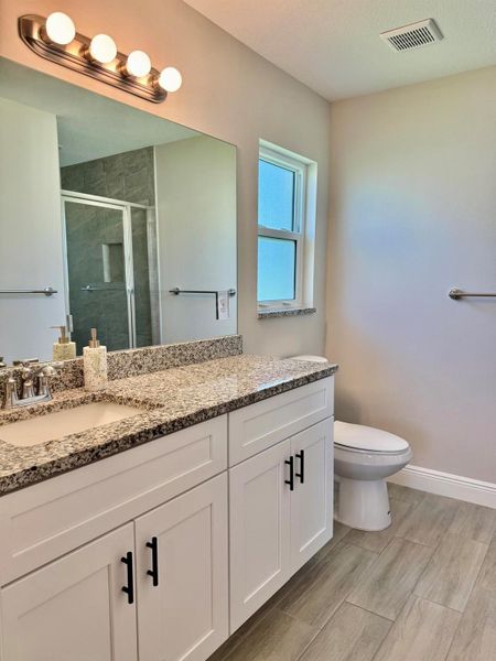 Furnished interior view inside a new home in , Okeechobee (Image 27).