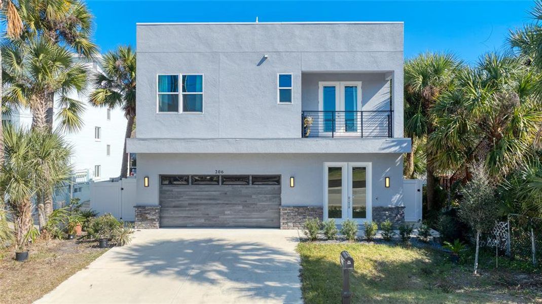 Front exterior of a new home in , Daytona Beach, FL, highlighting curb appeal (Image 28).
