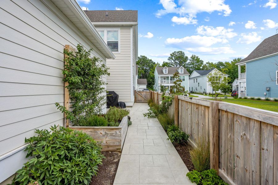 Front exterior of a new home in Twin Lakes, Johns Island, SC, highlighting curb appeal (Image 18).
