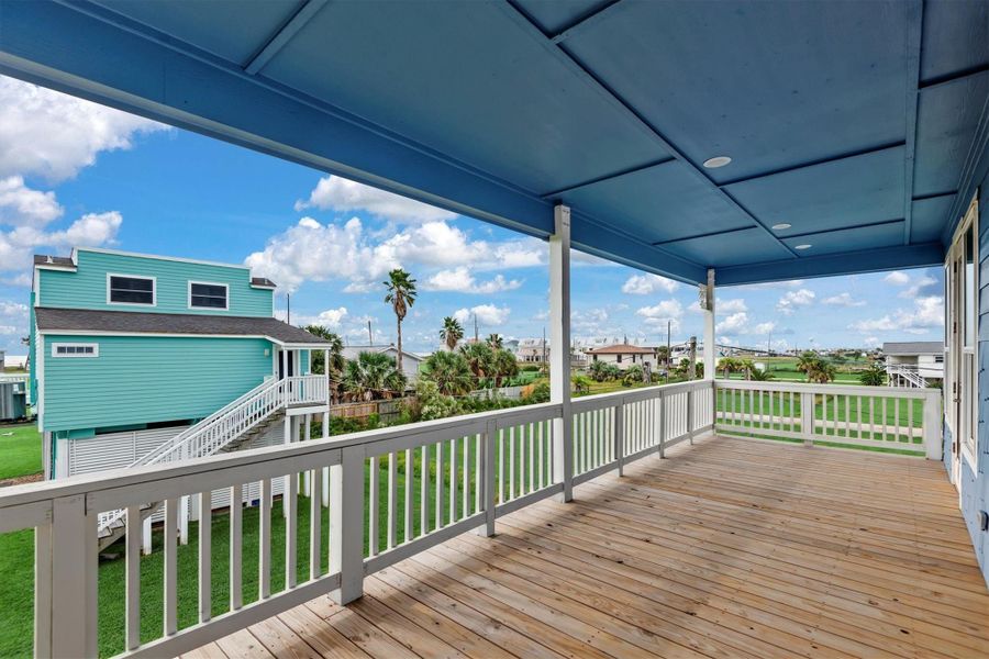 Large covered patio facing the beach!