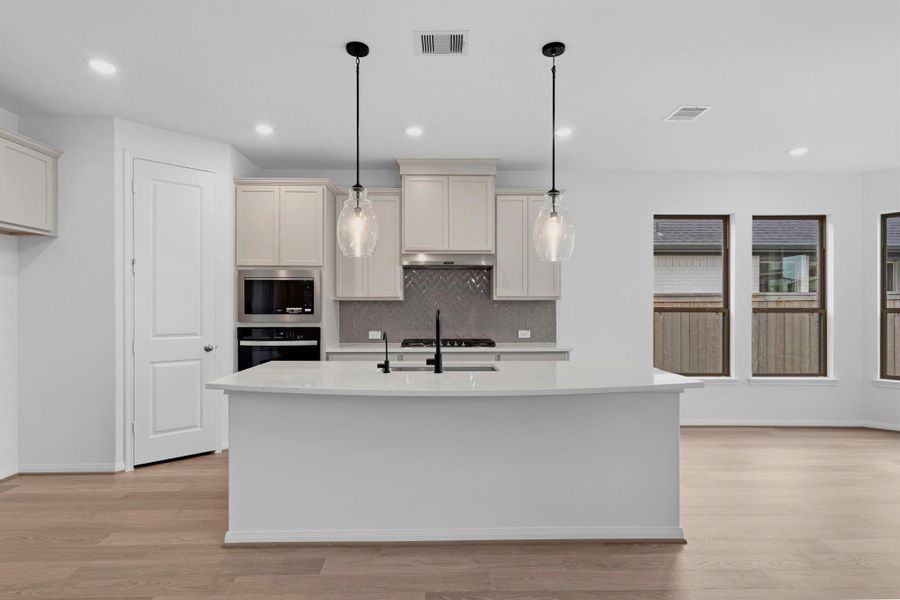 Furnished interior view inside a new home in Bridgeland, Cypress (Image 14). Furnished interior view inside a new home in Bridgeland, Cypress (Image 14).