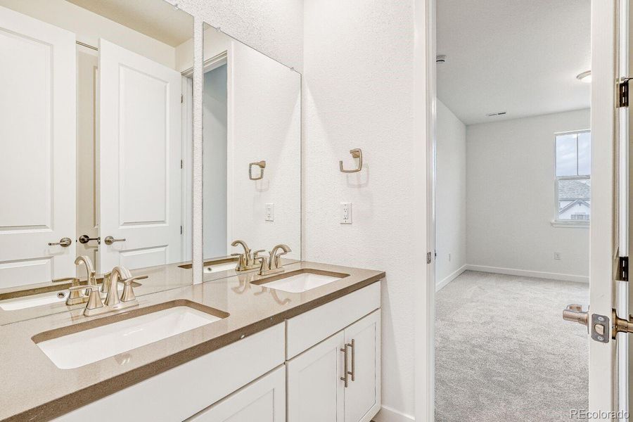 Furnished interior view inside a new home in Red Rocks Ranch, Morrison (Image 6).