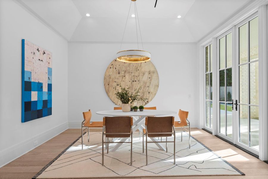 Host gatherings with elegance under designer lighting, with direct access to the inviting wraparound back porch. Host gatherings with elegance under designer lighting, with direct access to the inviting wraparound back porch.