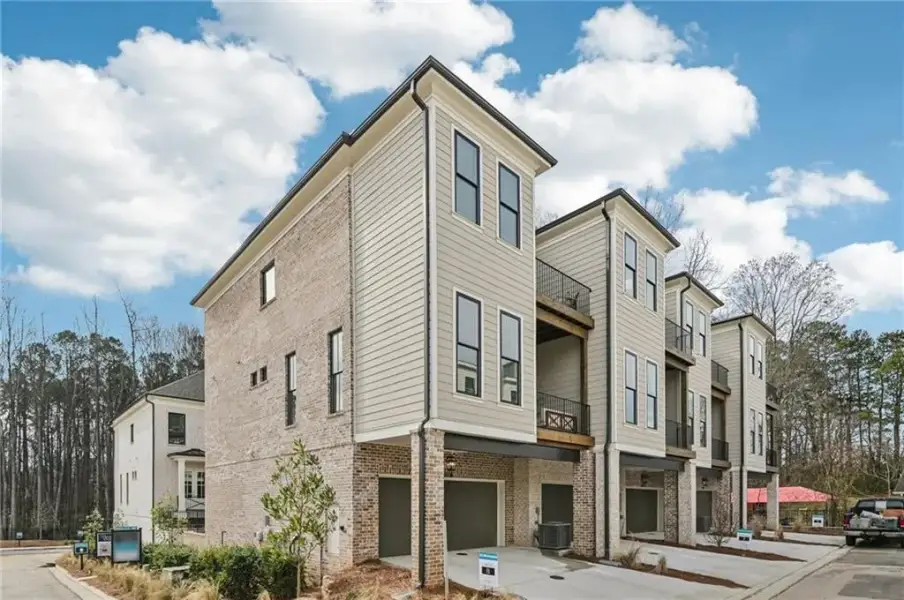 Views of back of building and showing back decks ~ Photos shown are of previously finished home and for viewing purpose only ~ Views of back of building and showing back decks ~ Photos shown are of previously finished home and for viewing purpose only ~