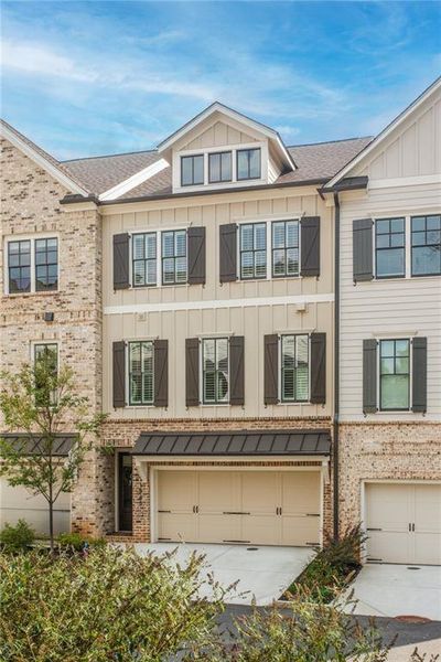 Front exterior of a new home in , Marietta, GA, highlighting curb appeal (Image 19).