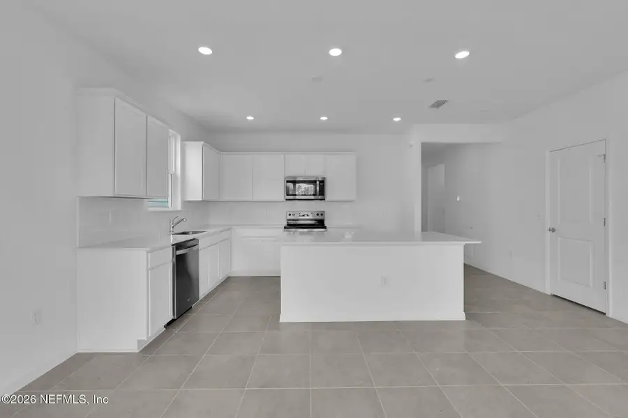 Furnished interior view inside a new home in Hyland Trail, Green Cove Springs (Image 5).