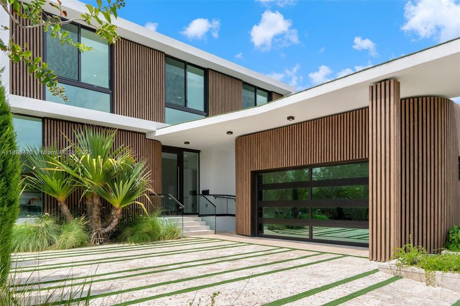 Exterior details and patio area of a home in , Miami Beach (Image 32). Exterior details and patio area of a home in , Miami Beach (Image 32).