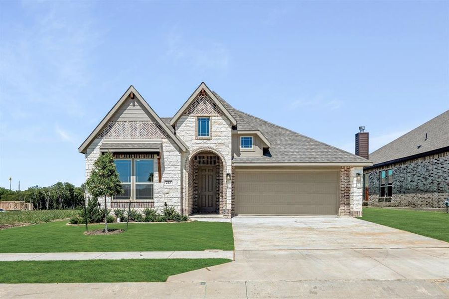 Front exterior of a new home in Sunset Ridge, Alvarado, TX, highlighting curb appeal (Image 1). Front exterior of a new home in Sunset Ridge, Alvarado, TX, highlighting curb appeal (Image 1).