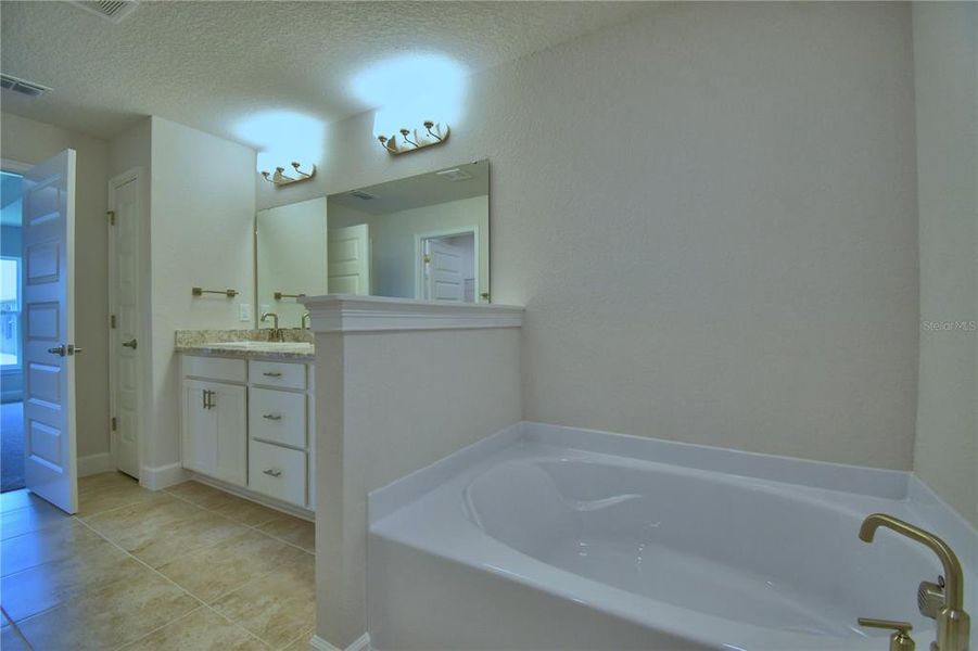 Furnished interior view inside a new home in Cadence Crossing, Auburndale (Image 14).