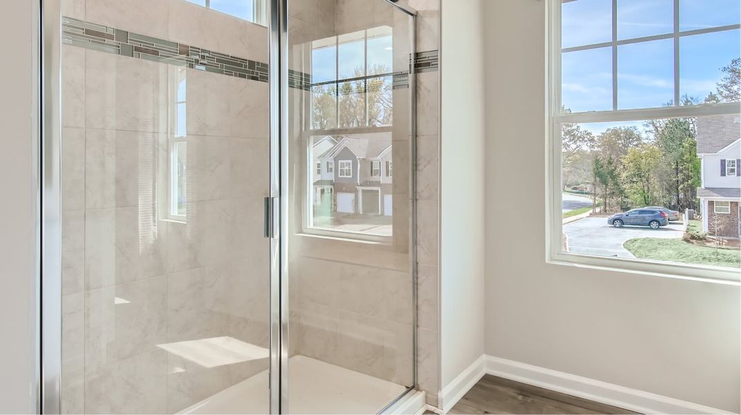 Owners Bathroom Glass Panel Walk in Shower