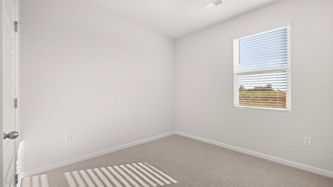 Representative unfurnished interior of a home built from the Sullivan by D.R. Horton in Byrd Village, Graniteville (Image 22).