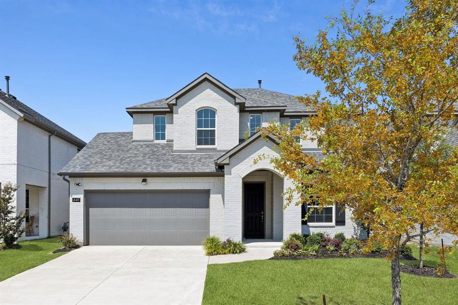 Front exterior of a new home in Venetian, Celina, TX, highlighting curb appeal (Image 18).