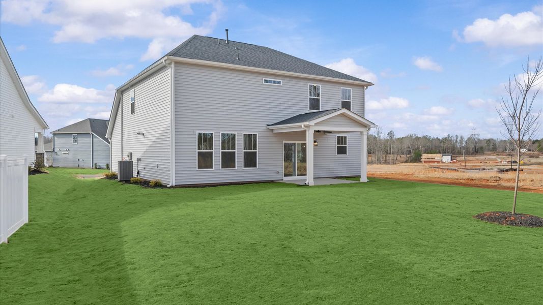 Exterior details and patio area of a home in Fox Hollow, Spartanburg (Image 22).