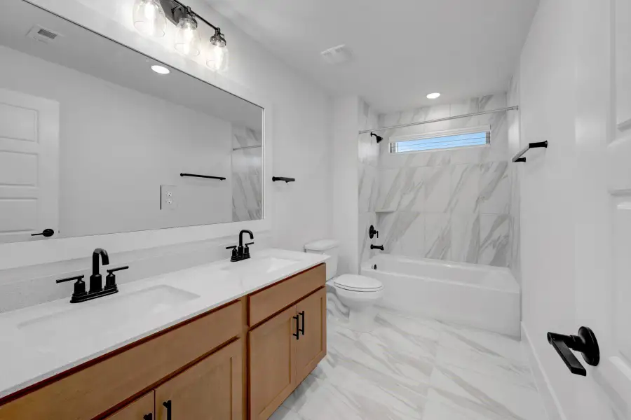 Furnished interior view inside a new home in Lone Star Landing, Montgomery (Image 7).