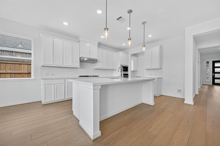 Natural light pours into the kitchen through the windows, creating a bright and vibrant atmosphere that makes cooking and gathering an enjoyable experience. Natural light pours into the kitchen through the windows, creating a bright and vibrant atmosphere that makes cooking and gathering an enjoyable experience.
