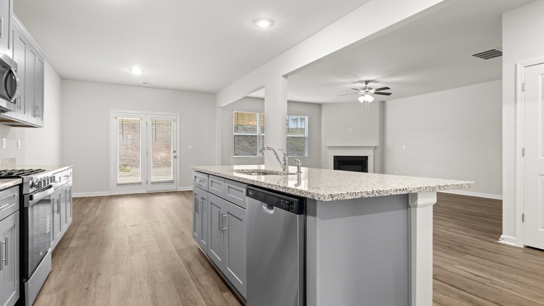 Representative furnished interior of a home built from the Halton by D.R. Horton in Highland Hills, Graniteville (Image 7).