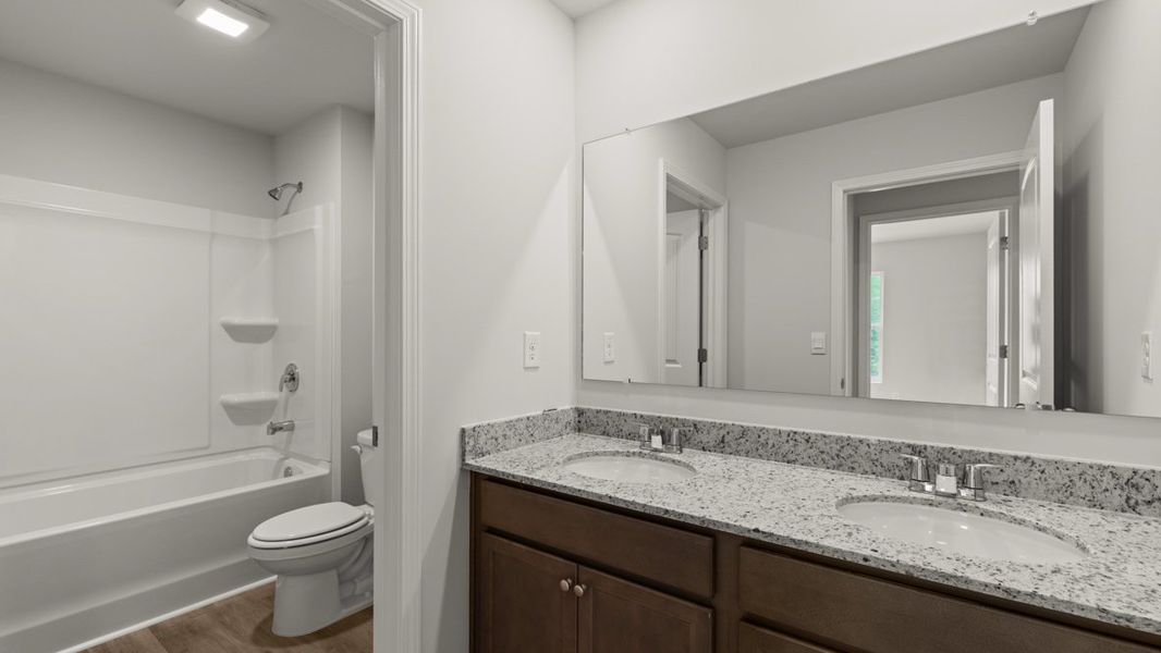 Representative furnished interior of a home built from the Green by D.R. Horton in Aurora Creek, Dallas (Image 12).