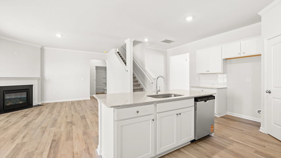 Representative furnished interior of a home built from the Hayden by D.R. Horton in Liberty Crossing, Braselton (Image 8).