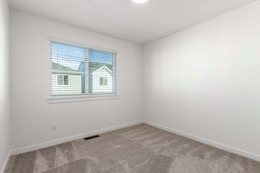 Spacious, unfurnished interior of a new home in Parkside at Victory Ridge, Colorado Springs (Image 24).