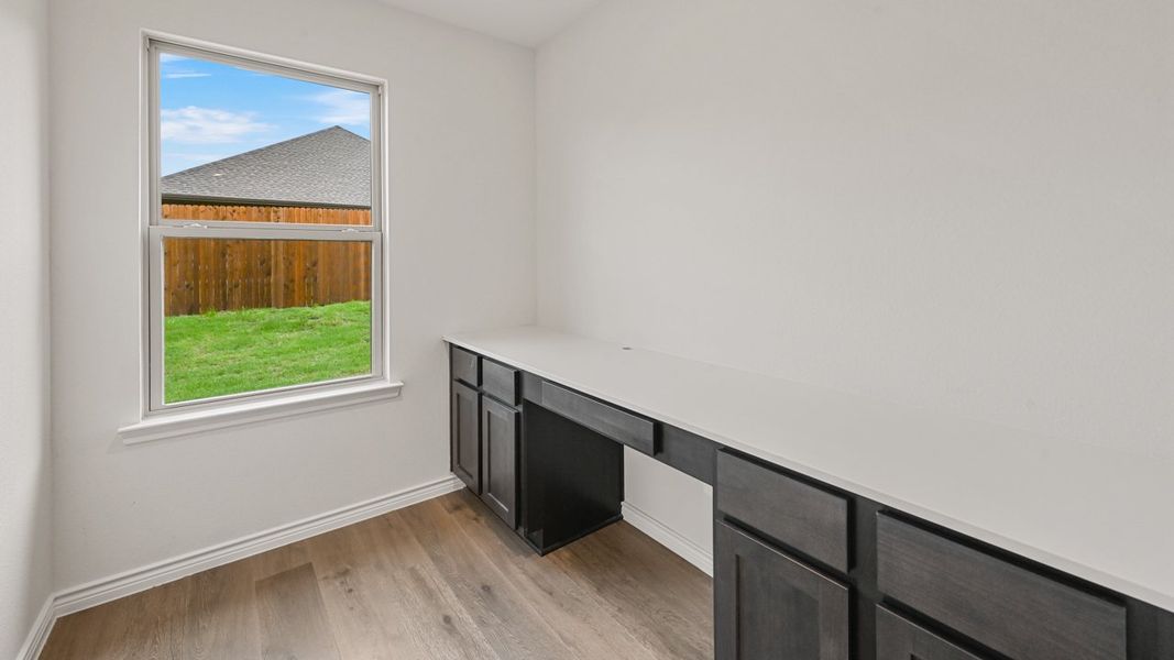 Furnished interior view inside a new home in Fireside by the Lake, Garland (Image 10).
