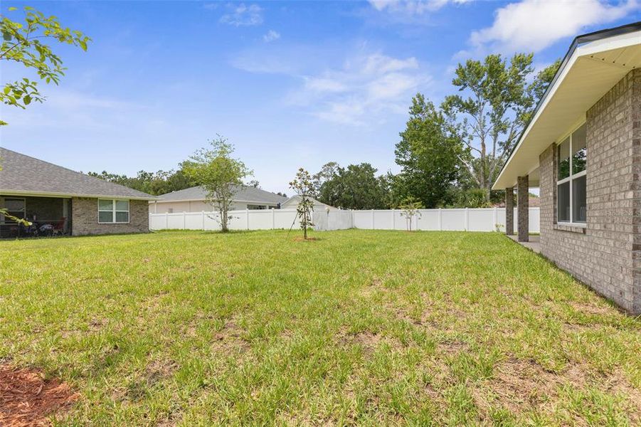 Exterior details and patio area of a home in Palm Coast, Palm Coast (Image 4).