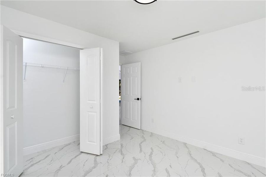 Spacious, unfurnished interior of a new home in , Lehigh Acres (Image 29). Spacious, unfurnished interior of a new home in , Lehigh Acres (Image 29).