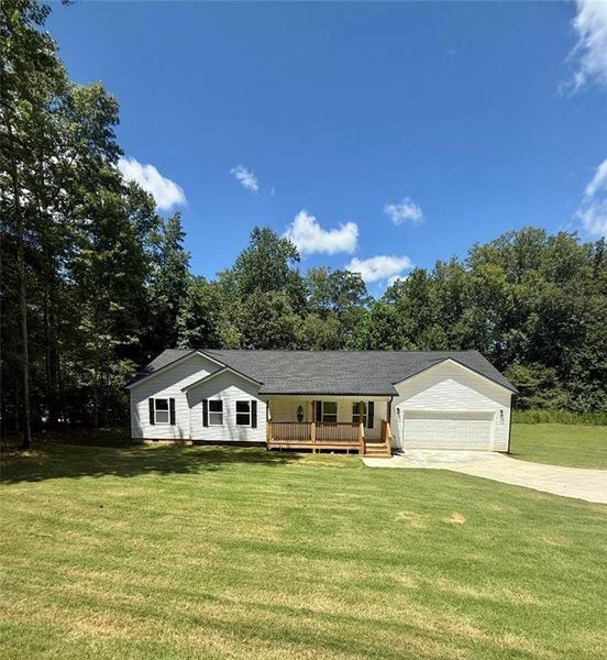 Front exterior of a new home in , Carrollton, GA, highlighting curb appeal (Image 2).