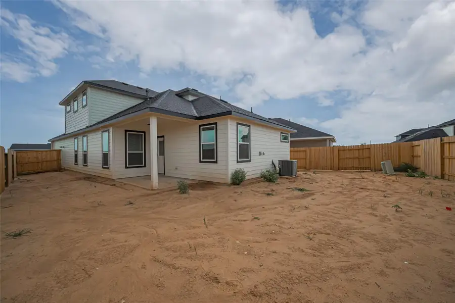 Exterior details and patio area of a home in La Segarra, Brookshire (Image 3).