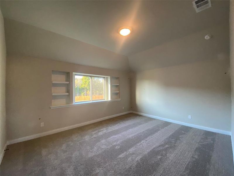 Bedroom 4 upstairs w/built-in shelves could be a great second master or living area for adult kid. Has bath 3 upstairs with huge vanity and walk-in shower.