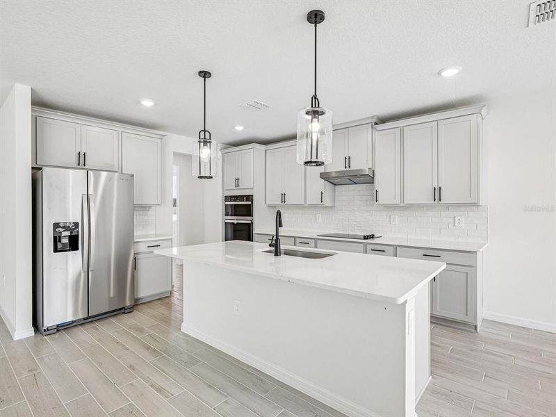 Furnished interior view inside a new home in Two Rivers - Signature Series, Zephyrhills (Image 5).
