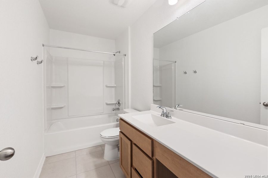 Furnished interior view inside a new home in Hidden Bluffs at TRP, San Antonio (Image 8).