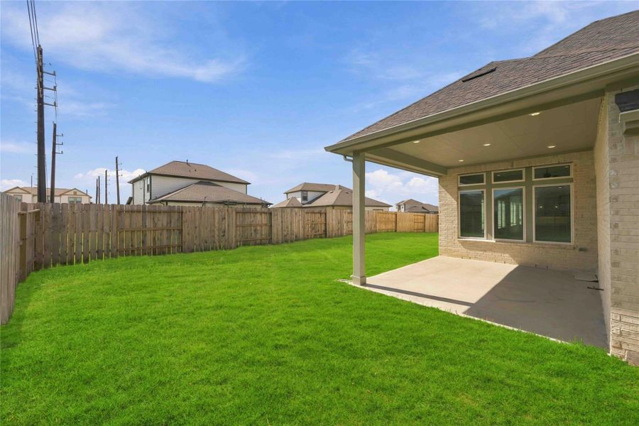 Exterior details and patio area of a home in Arabella on the Prairie, Richmond (Image 21).